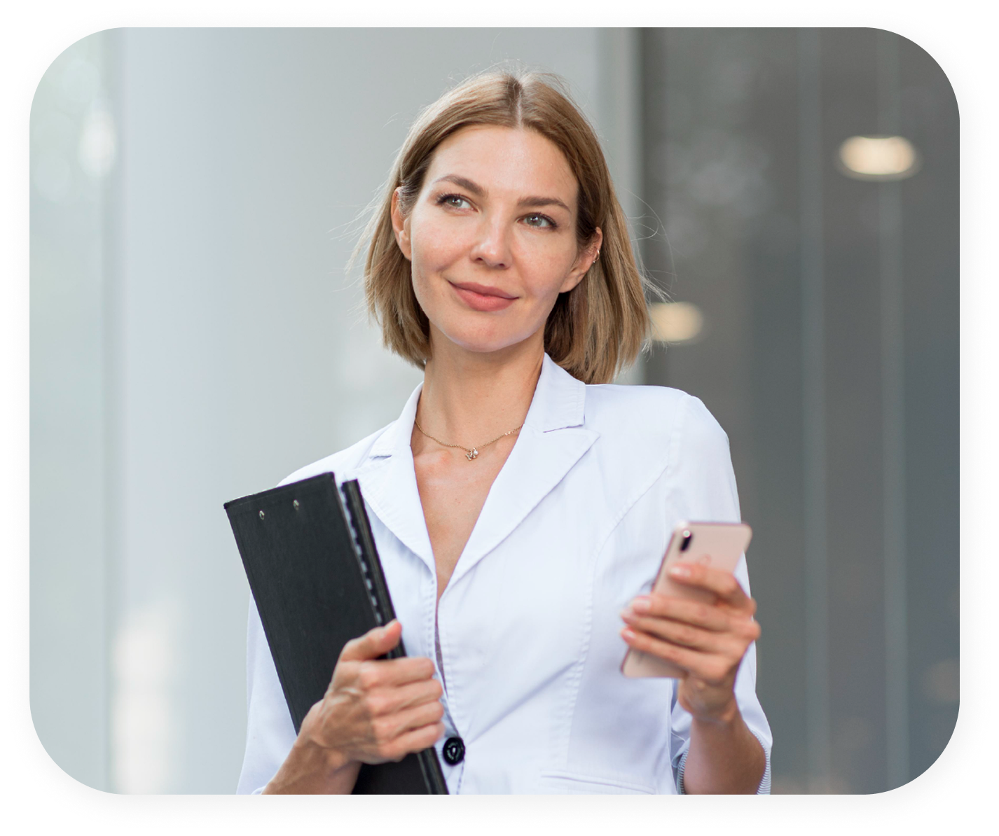 Professional businesswoman with documents and phone